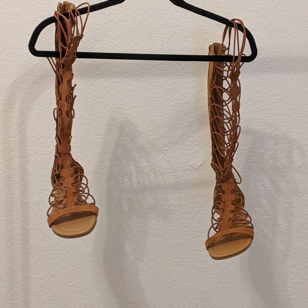 Brown knee high gladiator sandals